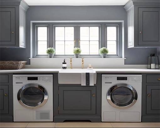 Dove gray shaker style door laundry room cabinets
